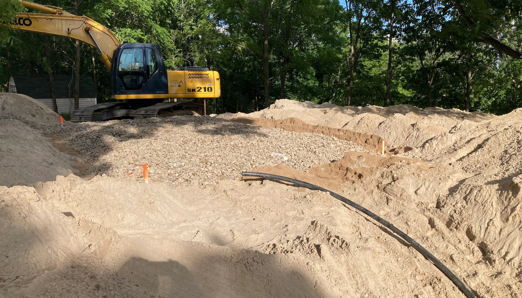 Replacing an aging septic system.