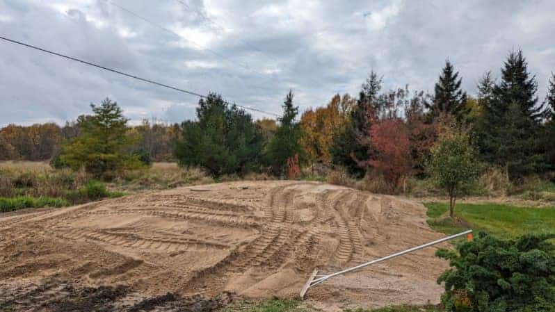 A plot of land with soil.